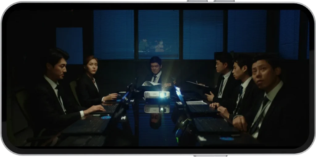 Korean-Movie-on-Vedu-App-Officials-in-meeting-room-on-projector